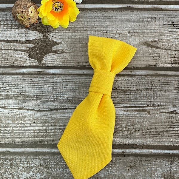 A classic solid yellow dog or cat necktie, slides on collar