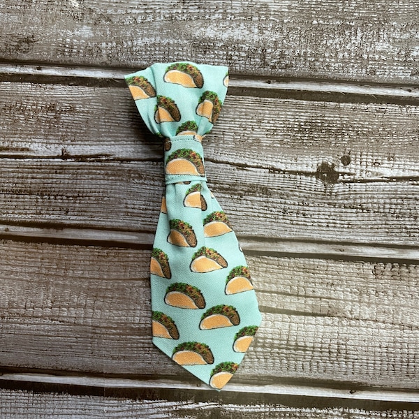 This totally terrific taco print dog or cat necktie, slides on collar.  Available in purple too!