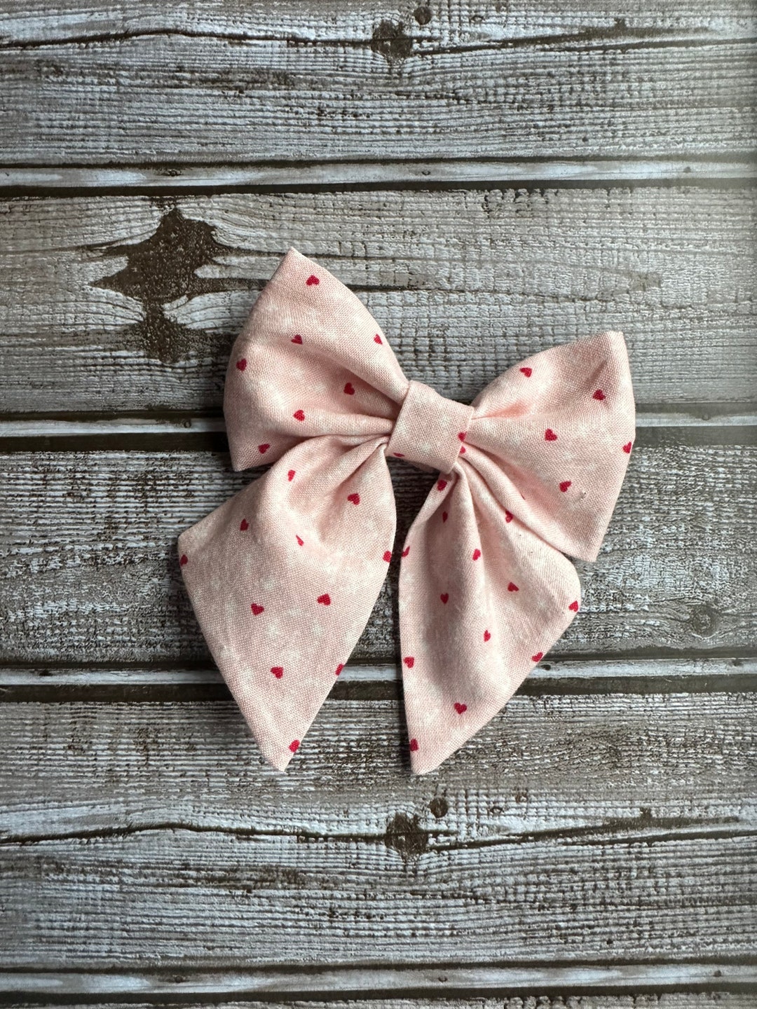 A Beautiful Pink With White and Red Heart Print, Perfect for Valentine ...