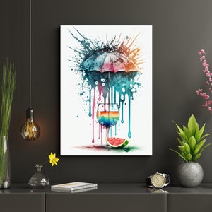 May include: A watercolor painting of a colorful cocktail with a rainbow umbrella and a slice of watermelon. The drink is in a clear glass with a stem and is surrounded by colorful paint splatters.
