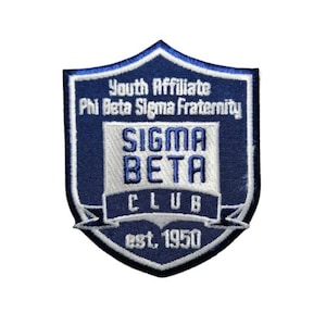 May include: Blue and white embroidered patch with the text "Youth Affiliate Phi Beta Sigma Fraternity Sigma Beta Club est. 1950" in a shield shape.