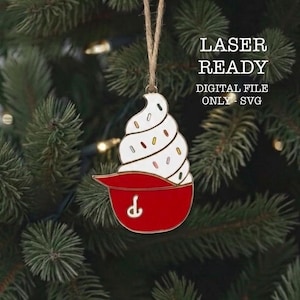 May include: A hanging ornament shaped like a soft serve ice cream cone in a red bowl with a white swirl top featuring colorful sprinkles and a small white letter d on the bowl. The text LASER READY DIGITAL FILE ONLY SVG is visible.