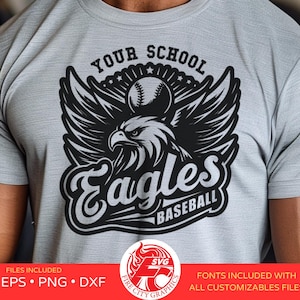 May include: A gray t-shirt with a black and white graphic of an eagle with a baseball in its beak. The text "YOUR SCHOOL Eagles BASEBALL" is printed on the shirt.
