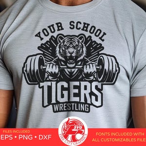 May include: A gray t-shirt with a black and white graphic design of a tiger lifting weights. The text "Your School Tigers Wrestling" is printed on the shirt.