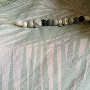 Silicone pacifier clip