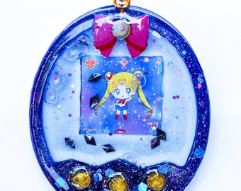Tamagotchi - Bandai - Tamagotchi Sailor Moon - résine Shaker - Tamagotchi Bandai - Porte-clés Tamagotchi - anime - paillettes - résine