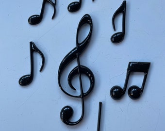 Set of 7 resin musical notes