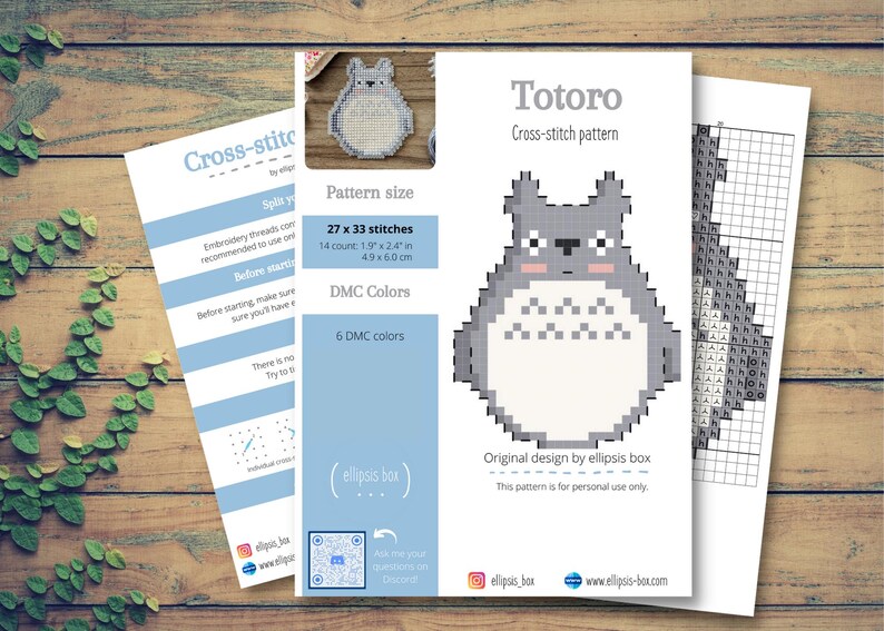 May include: A cross-stitch pattern featuring the character Totoro, with a pattern size of 1.9 x 2.4 inches (4.9 x 6.0 cm). The design includes 6 DMC colors and is an original design by ellipsis box. The image also shows instructions.