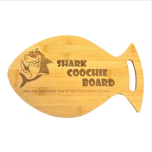 Shark Coochie Board on fish shaped bamboo cutting board (charcuterie board)