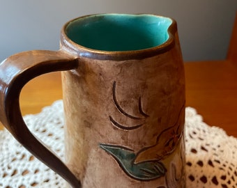 Vintage handmade pottery pitcher