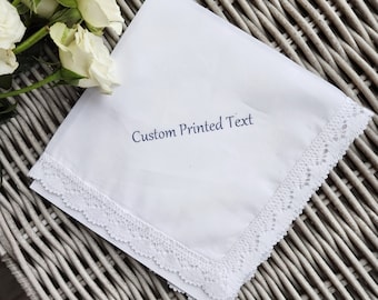 May include: White cotton handkerchief with a lace border and the text "Custom Printed Text" embroidered in blue.