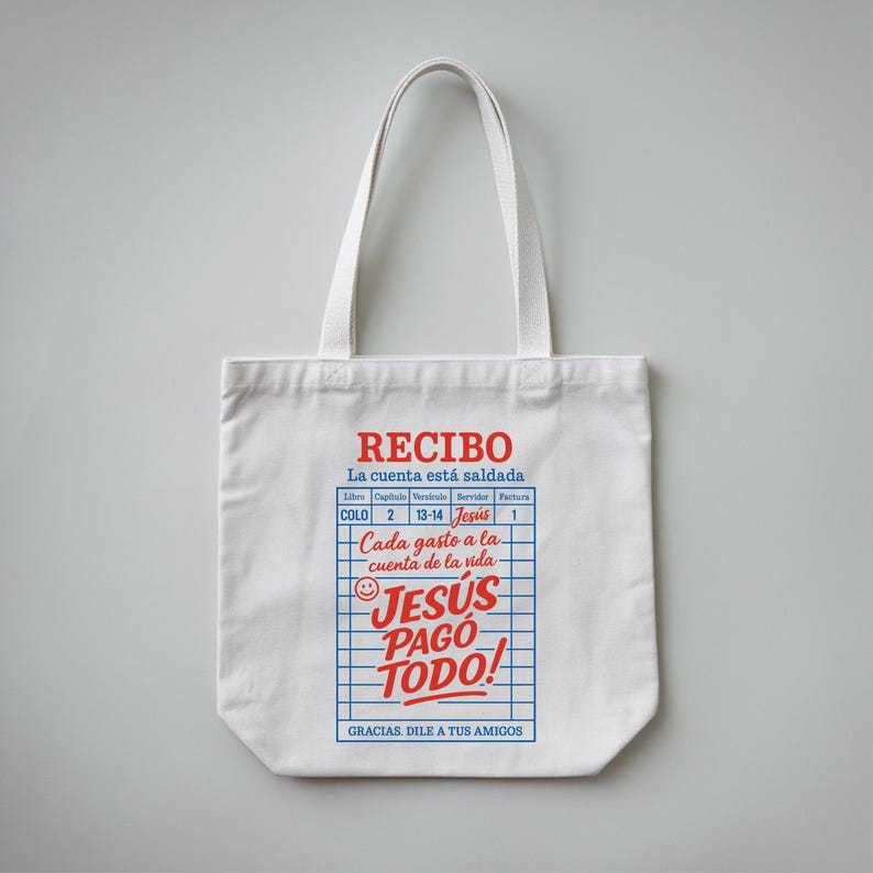Może przedstawiać: Biała pł&oacute;cienna torba z czerwono-niebieskim nadrukiem, na kt&oacute;rym widnieje napis "RECIBO La cuenta est&aacute; saldada" oraz "JESUS PAGO TODO!" z uśmiechniętą buźką. Grafika przedstawia paragon z napisem "COLO 2 13-14 Jesus 1" oraz "Cada gasto a la cuenta de la vida". Tekst u dołu grafiki brzmi "GRACIAS. DILE A TUS AMIGOS".