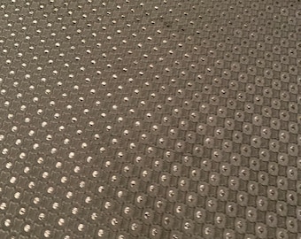 May include: A dark grey fabric with a subtle silver pattern of small squares and dots.