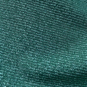 May include: Close-up of a teal fabric with a textured, ribbed pattern. The fabric has a subtle shimmer.
