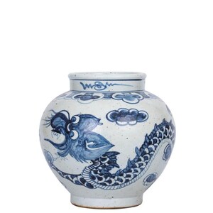 May include: A white ceramic vase with a blue and white dragon design. The dragon is depicted in a swirling pattern with clouds in the background.