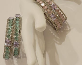 AD Bangles set. High quality never tarnish. Size Large inner diameter is 2.5 inches. US size 2-8