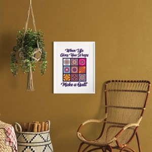 May include: A white framed print with a colorful patchwork quilt design and the text "When life gives you scraps make a quilt".