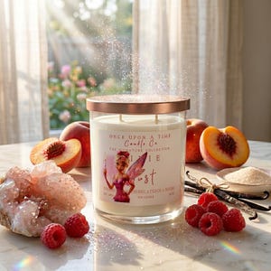 May include: A large glass candle with a copper lid, featuring a fairy illustration and the text "Once Upon A Time Candle Co." The candle is surrounded by peaches, raspberries, vanilla beans, and sugar. The candle is labeled "Pixie Dust".