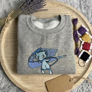 Glänzender Anime bestickter Pullover | Kawaii Stickerei Pullover