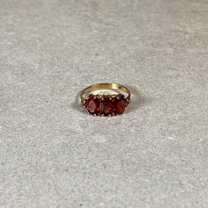 Garnet 3 Stone Ring in 9k Gold