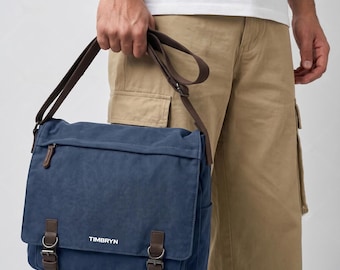 Bolso bandolera de lona para portátil, con detalles de cuero.