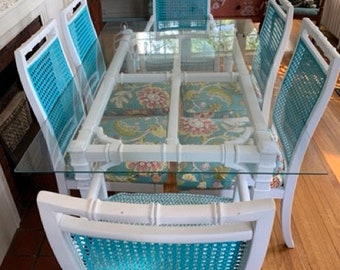 Vintage French Country, cottage style glass top white dining table and 6 upholstered turquoise cane-backed chairs, floral fabric seats