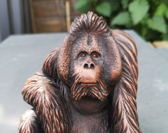 Orangutan statue in copper