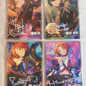 May include: Four holographic trading cards featuring anime characters with colorful backgrounds and signatures. The characters are Shu Itsuki, Mika Kagehira, Yuta Aoi, and Hinata Aoi.