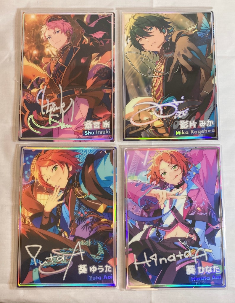 May include: Four holographic trading cards featuring anime characters with colorful backgrounds and signatures. The characters are Shu Itsuki, Mika Kagehira, Yuta Aoi, and Hinata Aoi.