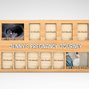 May include: A wooden photo frame with nine spaces for pictures. The frame is designed to hold photos from a pregnancy journey, with labels for each month. The first space is labeled "My First Sight" and the last space is labeled "My Newborn".