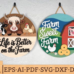 Könnte beinhalten: Zwei runde Holzschilder mit Bauernhof-Motiven. Eines zeigt "Life is Better on the Farm" mit Kuh-, Ochsen- und Hühnerfiguren. Das andere zeigt "Farm Sweet Farm" mit einem Schwein, einem Huhn und Heuballen. Beide haben Seilaufhänger.