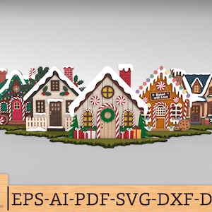 May include: A collection of colorful gingerbread houses with snow-covered roofs, candy cane accents, and festive decorations. One house has a sign that reads "Baked with Love". The houses are arranged on a green base, perfect for holiday decor.