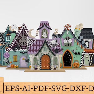 May include: A collection of five decorative Halloween-themed wooden houses featuring colourful designs with ghosts, spiders, bats, pumpkins, and candy motifs. The structures include intricate patterns, arched doorways, and chimneys, presented as a set.