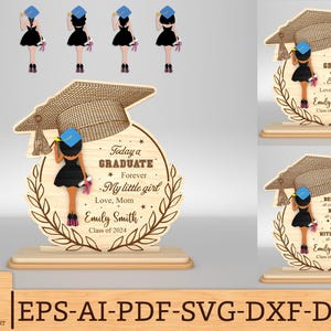 May include: A wooden cutout of a graduation cap with a silhouette of a girl in a graduation gown and cap. The cutout has the text "Today a Graduate" and "Forever My Little Girl" with the name "Emily Smith" and the year "Class of 2024".