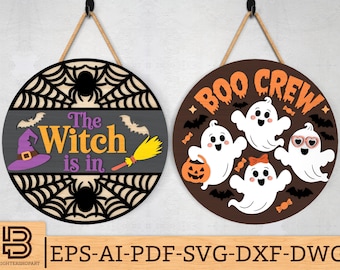May include: Two round Halloween signs. One says "The Witch is in" with a witch hat, bats, and a broom. The other says "Boo Crew" with ghosts, bats, and candy. Both have a spiderweb design.