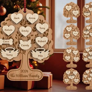 May include: Wooden family tree ornament with heart-shaped name tags. The ornament features names like Jack, Anna, and Emily, with the text "The William Family" and the year 2024. It's a personalized Christmas decoration.
