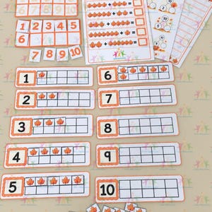 May include: A set of educational maths learning materials featuring number cards, ten-frame counting strips with orange leaf icons, and worksheets titled I can add up to 10 and NUMBER BONDS TO 10, all decorated with autumn leaf graphics.