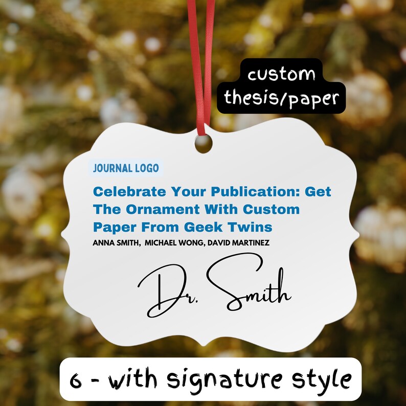 Puede incluir: Adorno blanco con forma de decoraci&oacute;n, con una cinta roja para colgar. Muestra el texto "Celebrate Your Publication: Get The Ornament With Custom Paper From Geek Twins" y una firma. Tambi&eacute;n est&aacute; presente el texto "custom thesis/paper".