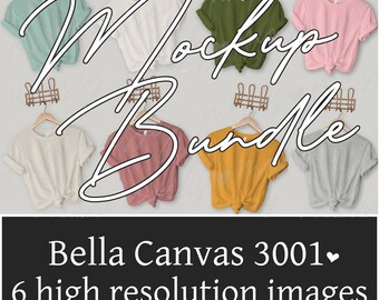 Könnte beinhalten: Mockup-Paket mit sechs Bella Canvas 3001 T-Shirts in verschiedenen Farben, darunter Weiß, Grün, Rosa, Beige, Rot, Gelb und Grau. Die Shirts hängen an Holzbügeln vor einem weißen Hintergrund.