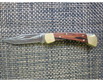 Buck 110 U  Folding Hunter knife is a classic and traditional favorite.