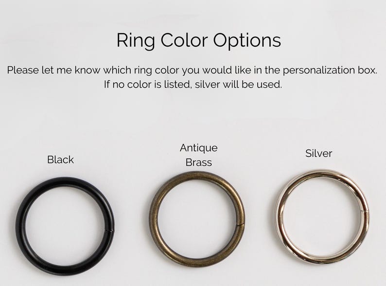 May include: Image showing ring color options: black, antique brass, and silver. Text above reads "Ring Color Options" and provides instructions for personalization. The image displays three circular rings in different metallic finishes.