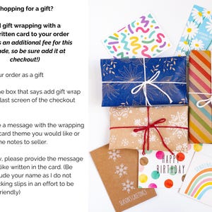 May include: Several rectangular packages wrapped in various patterned papers including blue with gold leaves, brown with white snowflakes, and multicolored diagonal stripes, tied with white or red string, alongside several greeting cards.