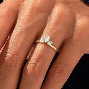 Marquise store trilogy ring
