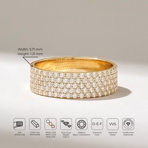 May include: A gold band ring with a row of small diamonds set in each of the five bands. The ring is 5.71 mm wide and 1.21 mm high. The diamonds are brilliant cut and have a D-E-F color and VVS clarity. The diamonds are conflict-free.
