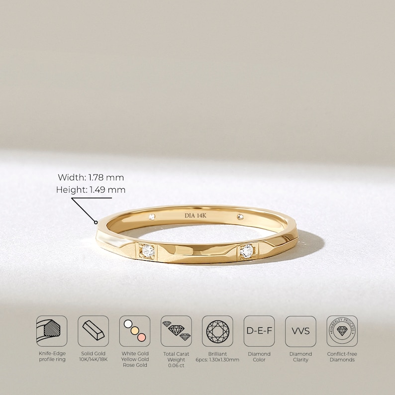 May include: A 14K yellow gold ring with a knife-edge profile, featuring two visible inset brilliant-cut diamonds. The band has a width of 1.78 mm and a height of 1.49 mm. The interior is stamped with DIA 14K, indicating solid gold construction.