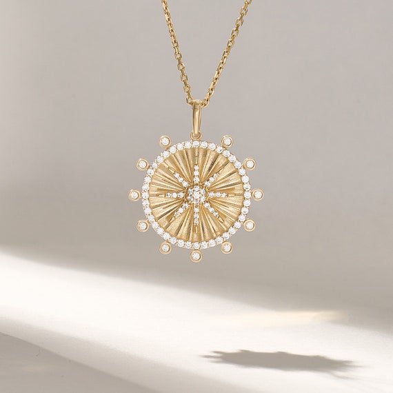 Starburst pendant necklace best sale
