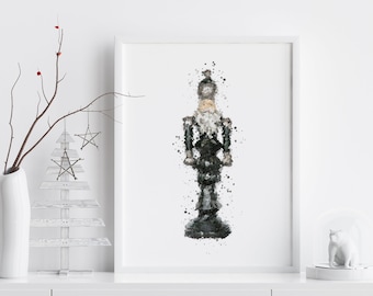 May include: A black and white watercolour painting of a nutcracker soldier. The soldier is wearing a black hat and a red coat. The background is white.