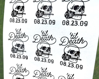 May include: Sheet of black and white stickers with a skull design. Each sticker features a skull with a rose, the phrase "'til Death", and the date 08.23.09. The stickers are on a white background.