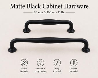 May include: Two matte black cabinet pulls with a curved design. The text reads Matte Black Cabinet Hardware, 96 mm & 160 mm Pulls, Zamak Material, Durable & Long Lasting, Easy to Install, and Screws Included. These metal handles feature rounded ends.