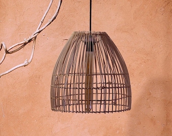 Lámpara delicada tejida a mano: iluminación suave para el dormitorio de invitados